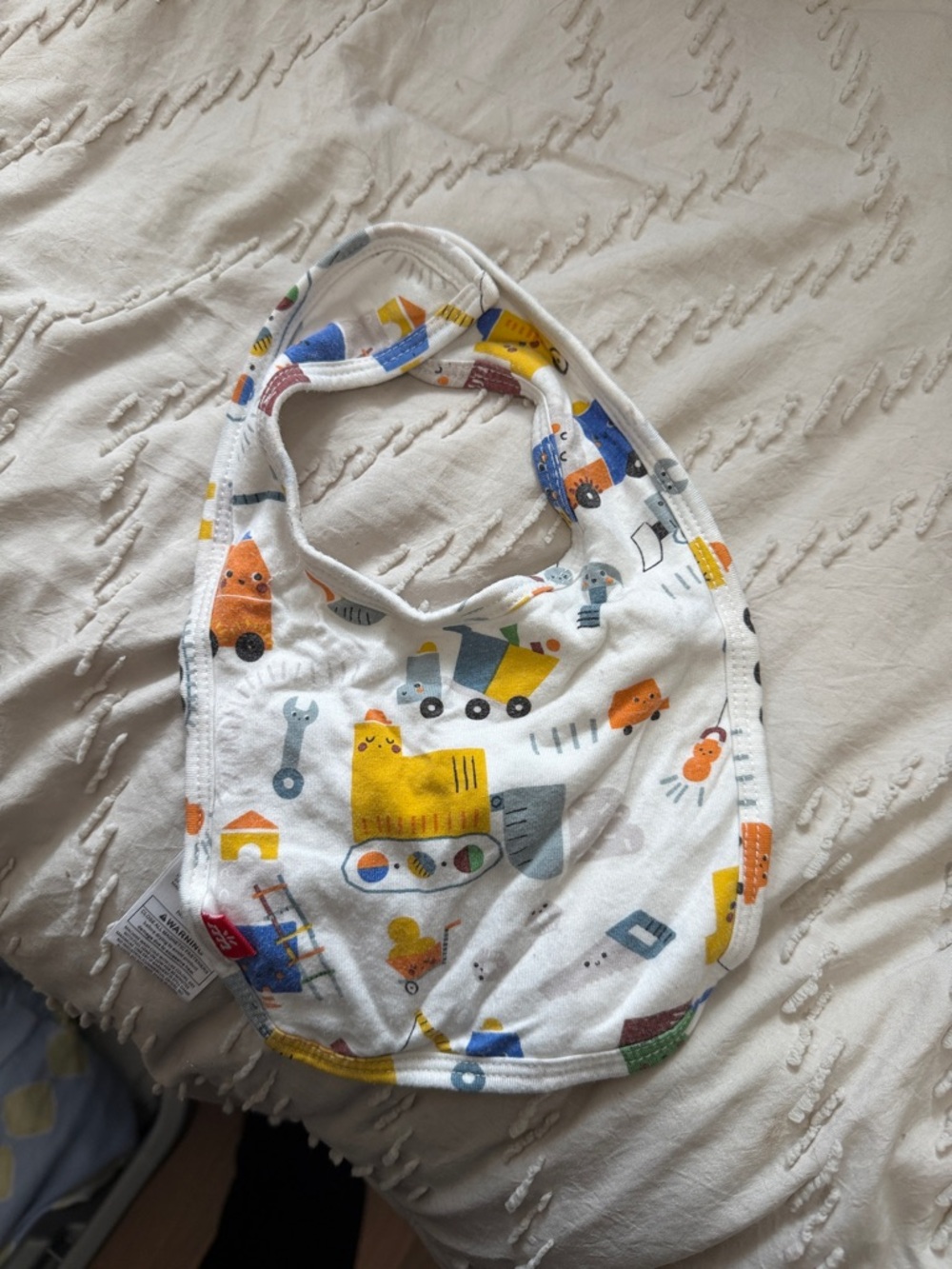 Magnetic Me White Bib with Yellow, Orange and Blue Construction Print